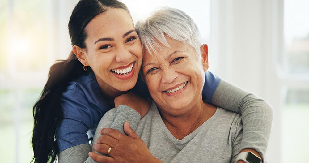 Mother and daughter with happy, healthy smiles